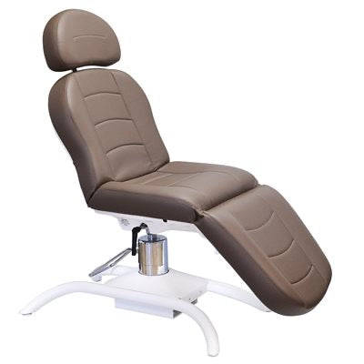 "Capella XL Cozy Chair with Hydraulic Pump, adjustable For beauty treatments.
- Hydraulic-base treatment chair.
- Hydraulic height adjusment with robust cylinder-stem and foot pump.
- Hydraulic backrest and legrest control.
- Tilting seat.
- Swivel chair (360°)."