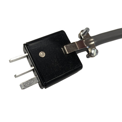"A black foot pedal with a rectangular plug designed for Fischer Epilator models TS-1, CB-X, and SE-5. The pedal measures 2.5” x 3.5” and includes a 7-foot cord for flexibility in electrolysis treatments."