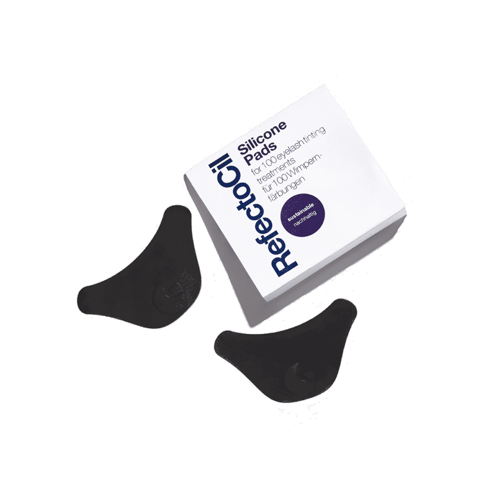 RefectoCil Silicone Pads, reusable and slip-resistant tools for precise lash tinting, ensuring protection and comfort during professional treatments. 2 Black eye pads in a cardboard box