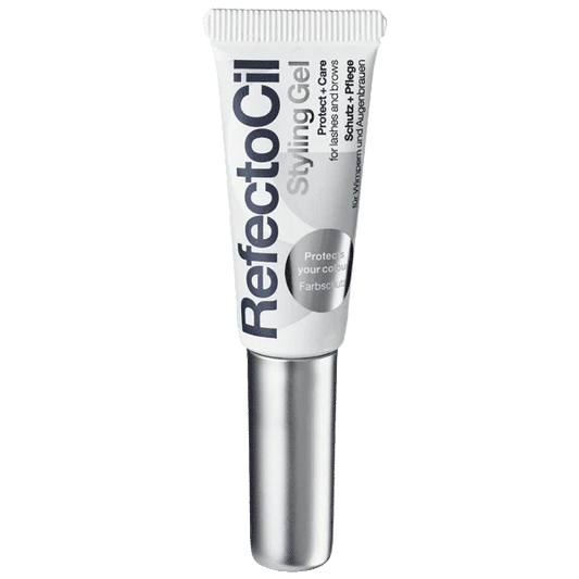 Refectocil Styling Gel, a clear gel for shaping and setting brows and lashes, providing long-lasting hold for a polished look. A soft tube with a silver cap